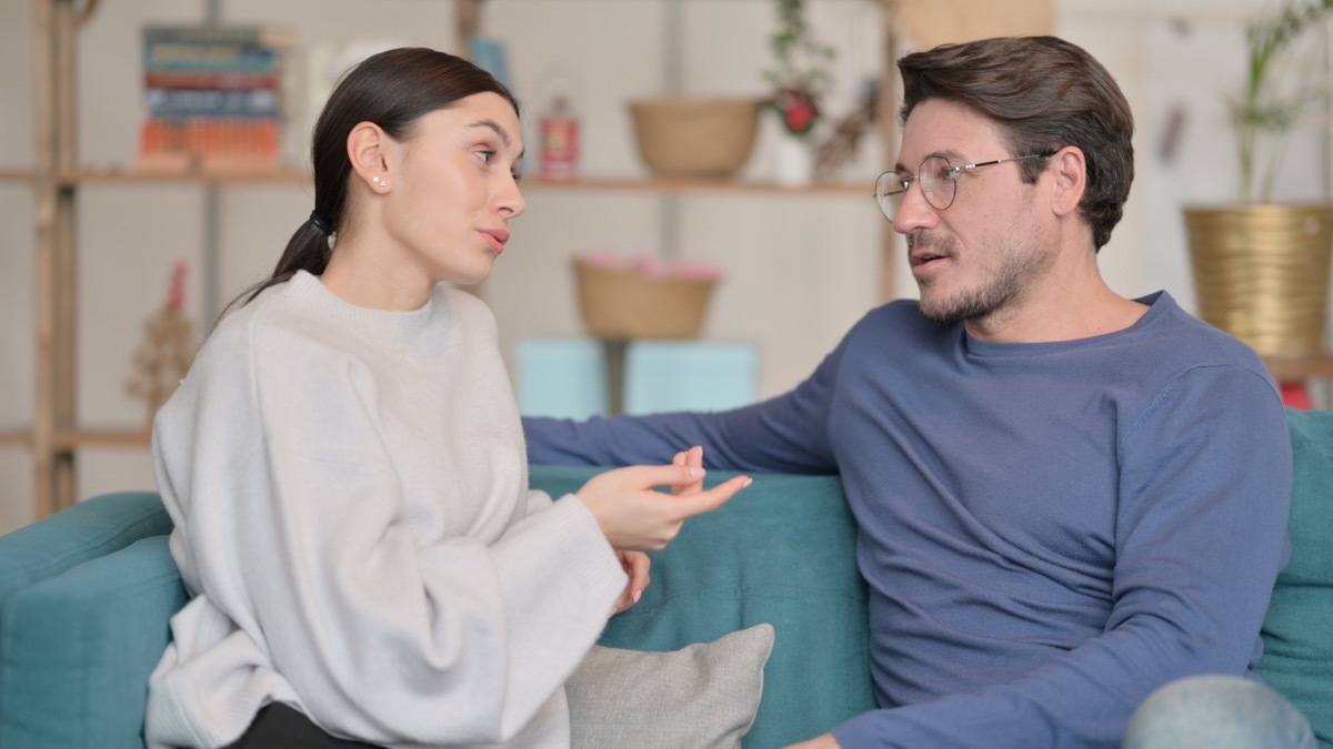 man and woman having a conversation