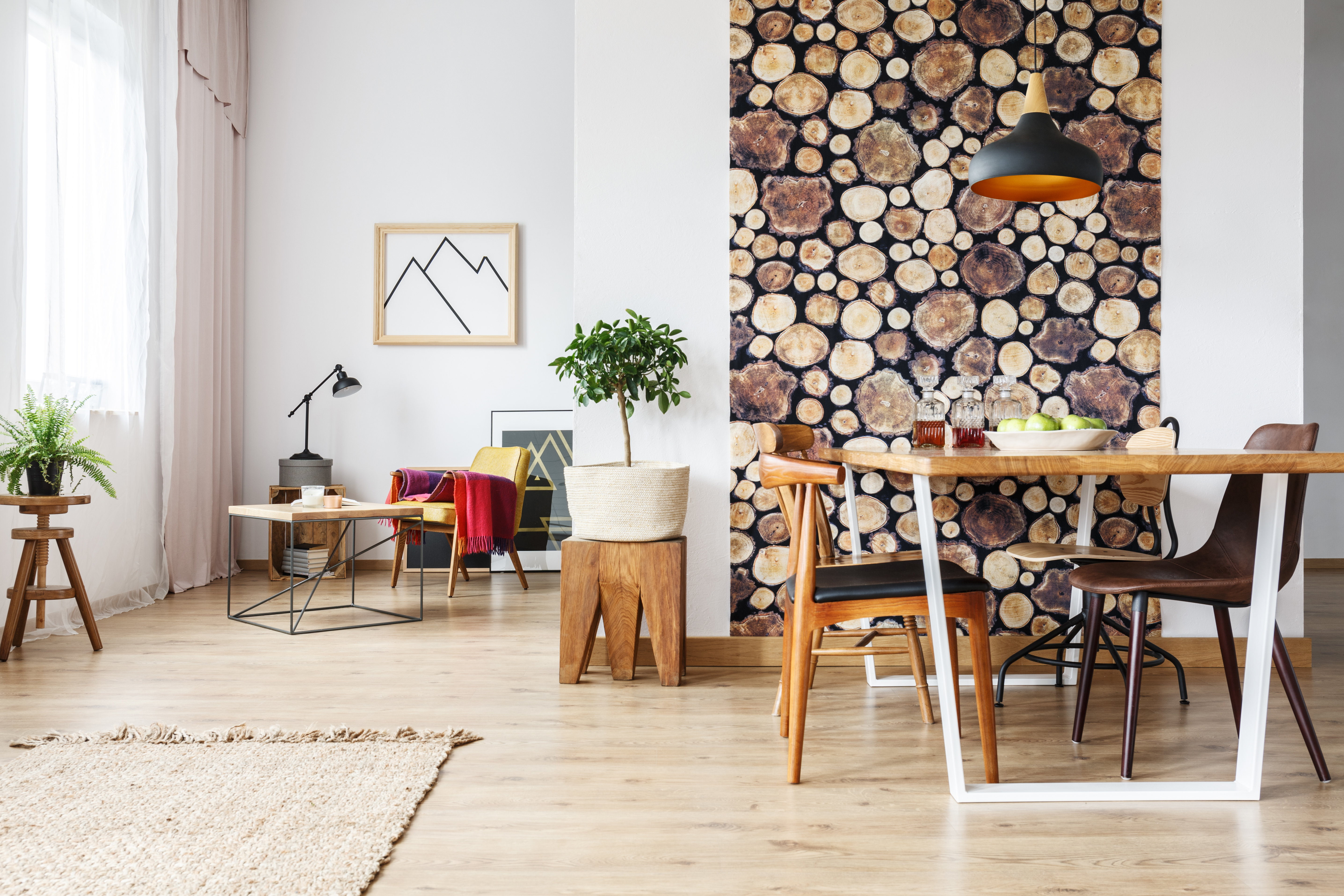 log accent wallpaper in dining room