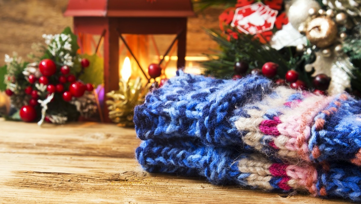 Wool Handwarmers with Christmas Decorations and Lantern Light