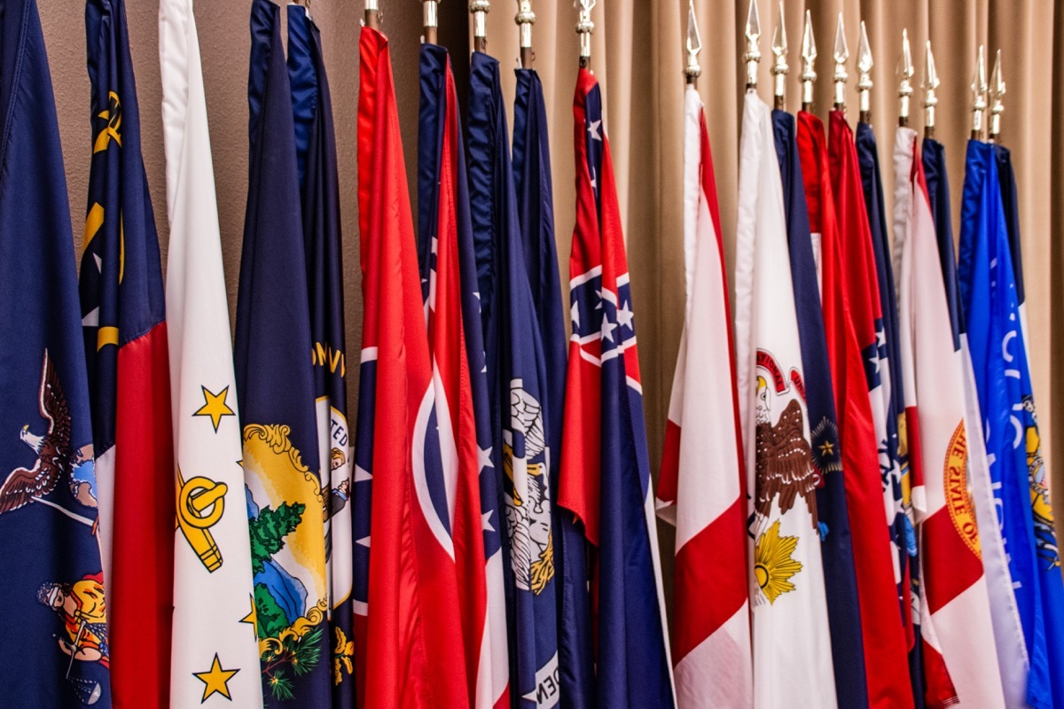 A row of flags from many states.