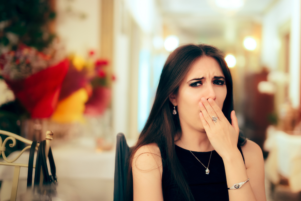 Woman is bored at a wedding