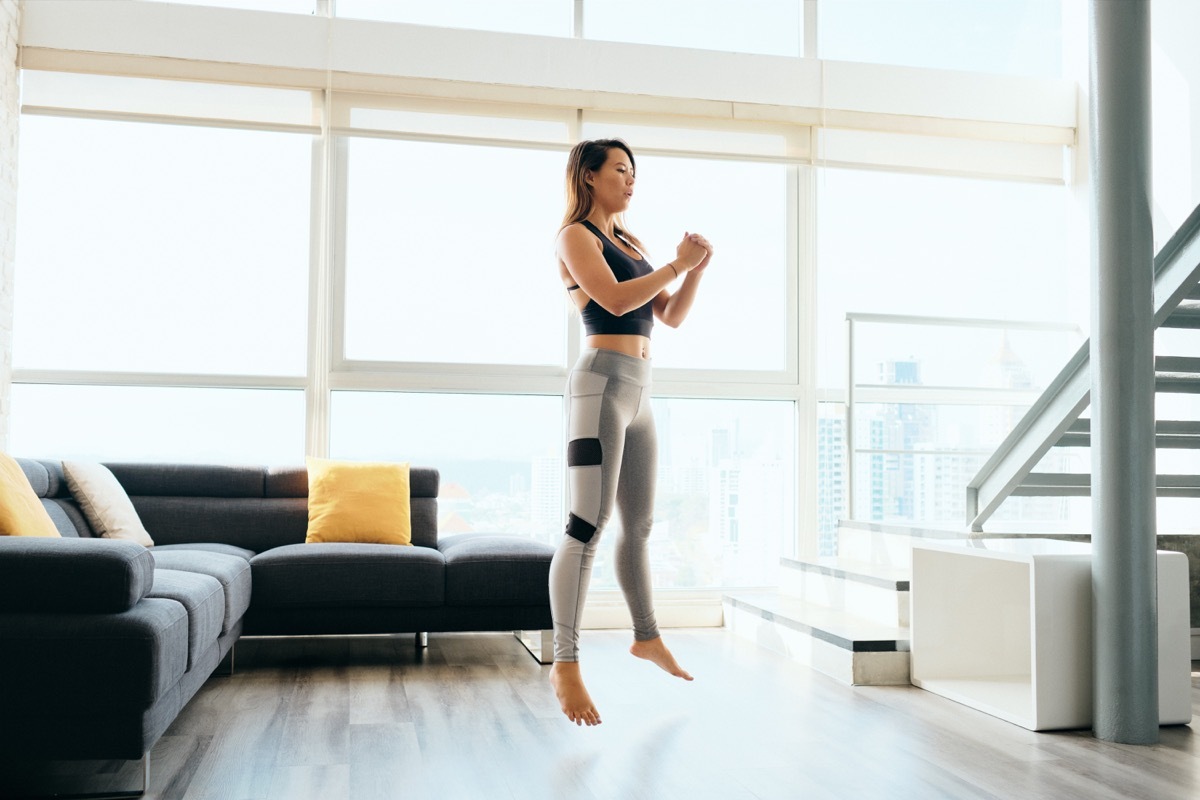 Woman doing jump squat