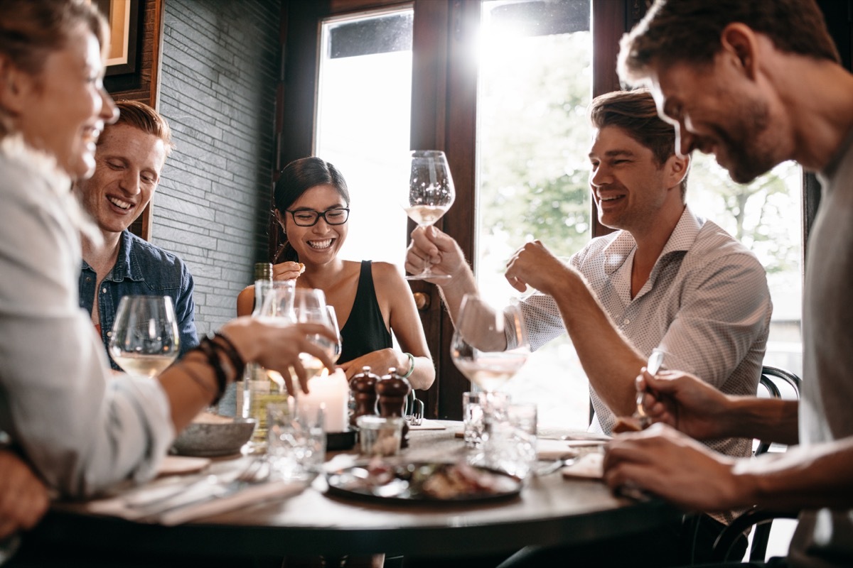 People eating in restaurant together