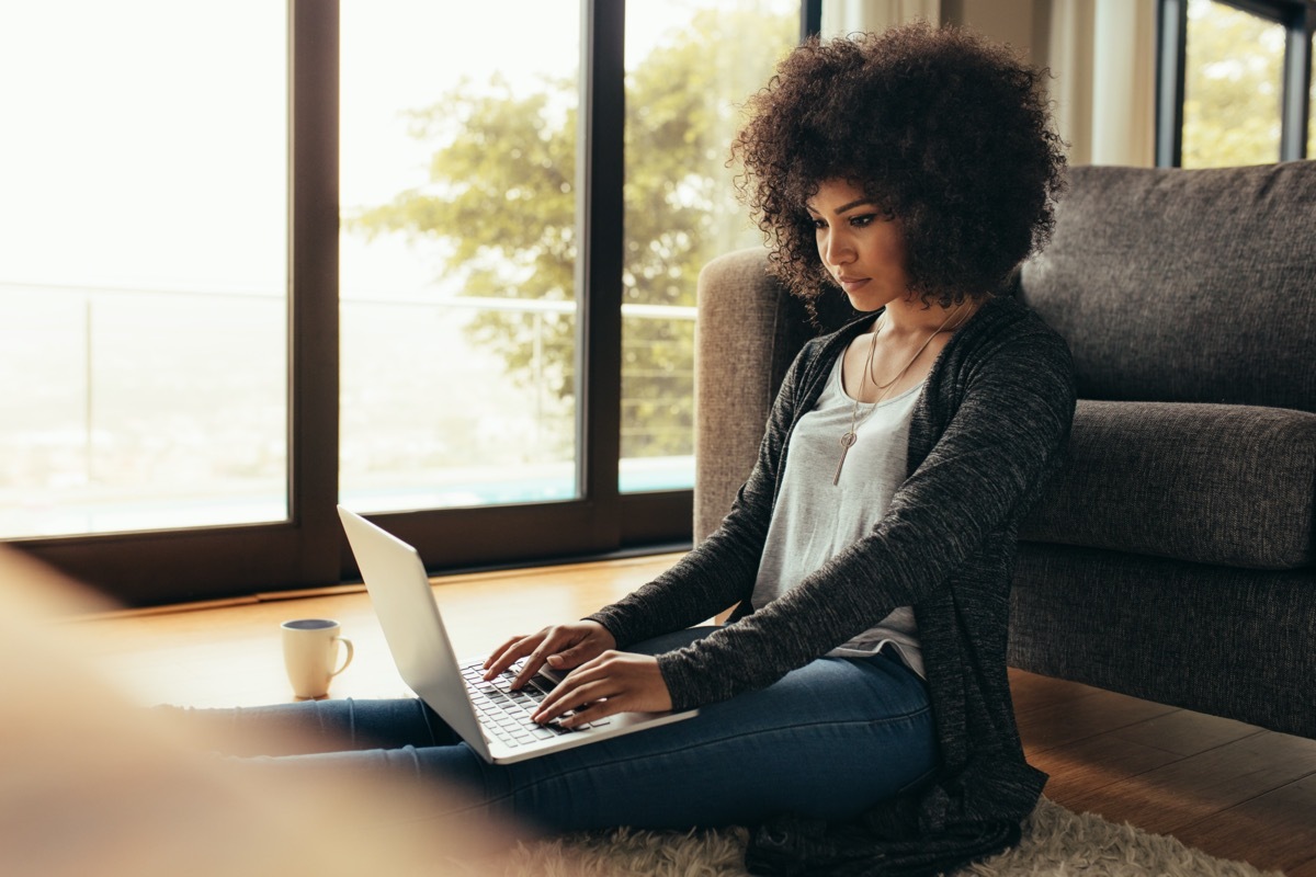 young black woman using laptop