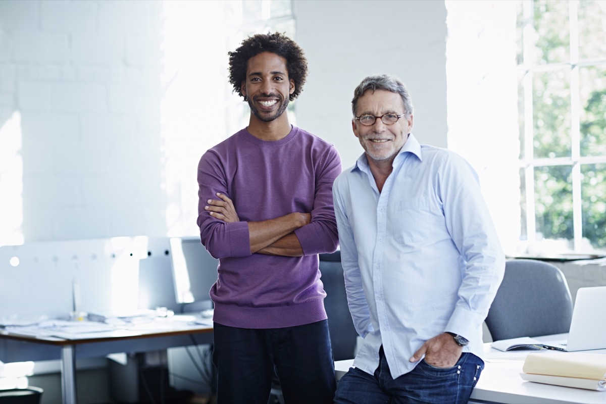 Portrait of business colleagues in a bright office