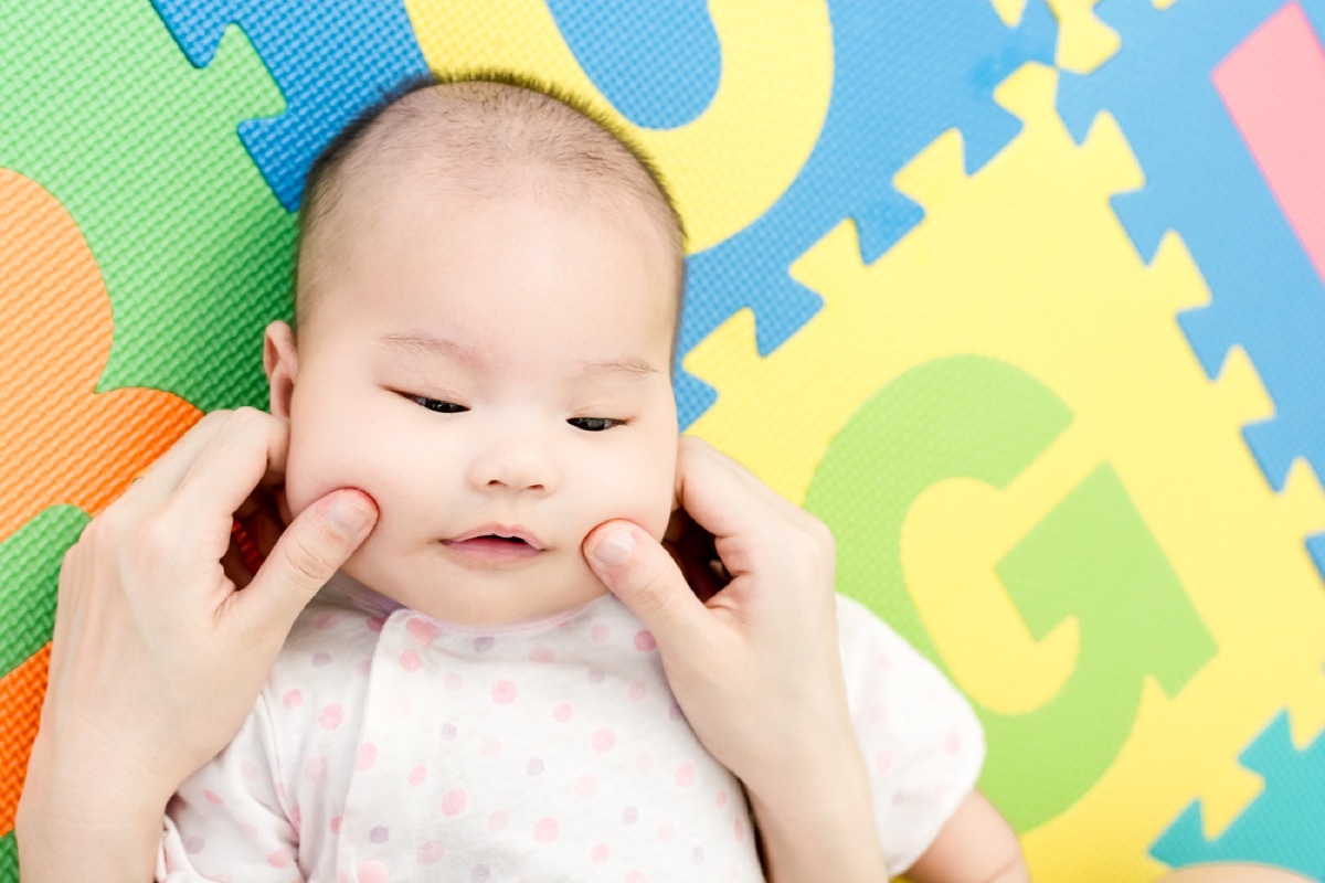 little girl having cheeks pinched, things that annoy grandparents