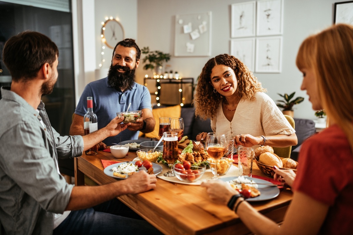 people enjoying dinner together