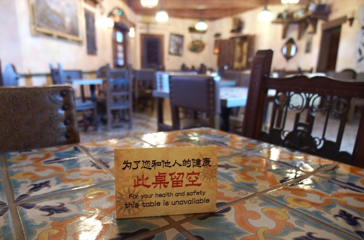 empty tables at a restaurant at shanghai disneyland