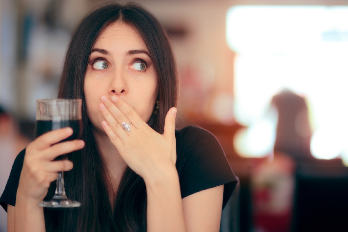 woman belching, subtle symptoms of serious disease