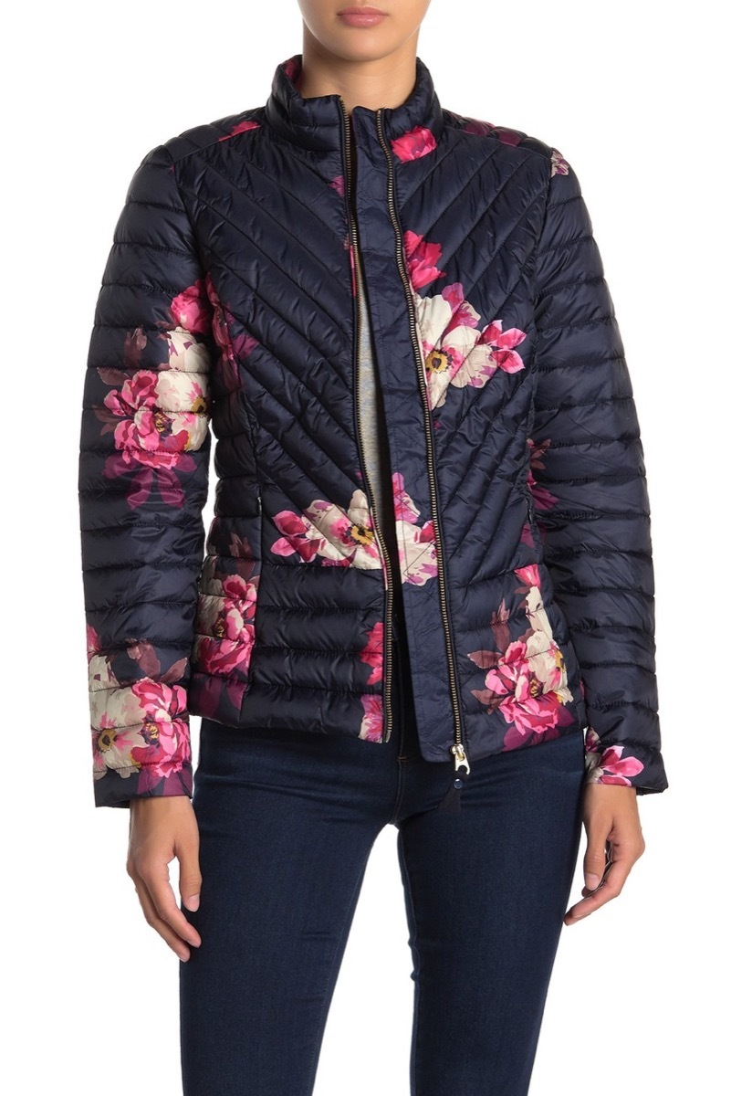 woman in black leggings and floral puffer coat, women's coats for winter