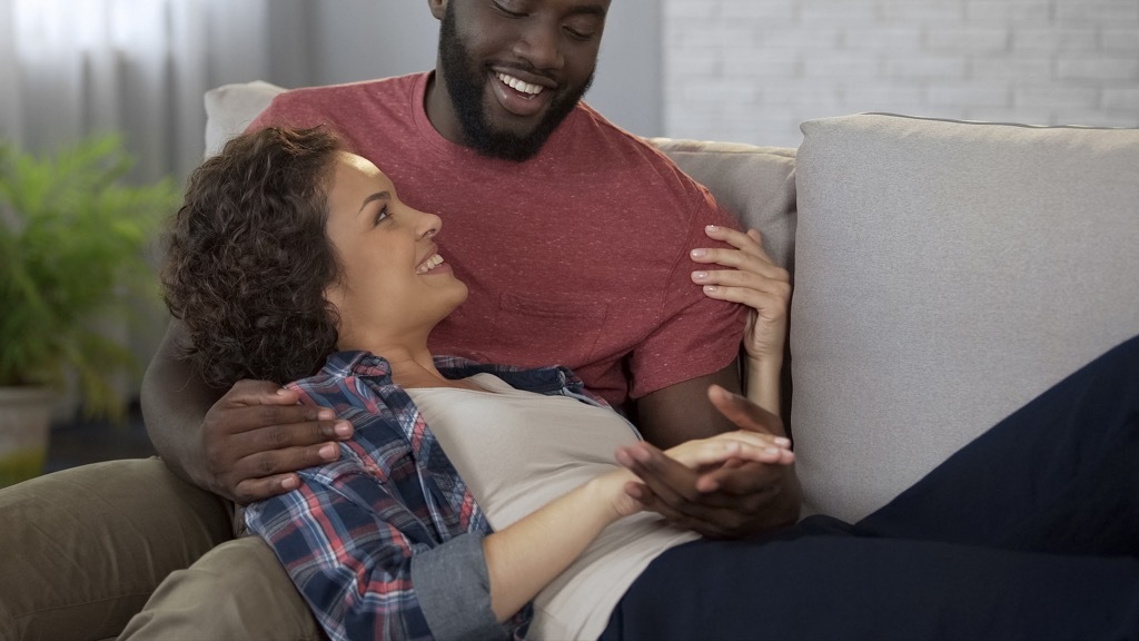 couple laughing together crazy health benefits of laughter