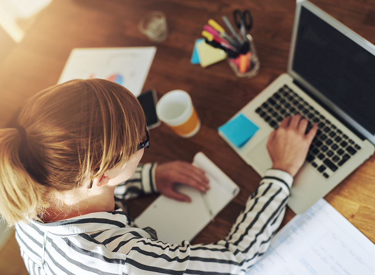 young female working at desk