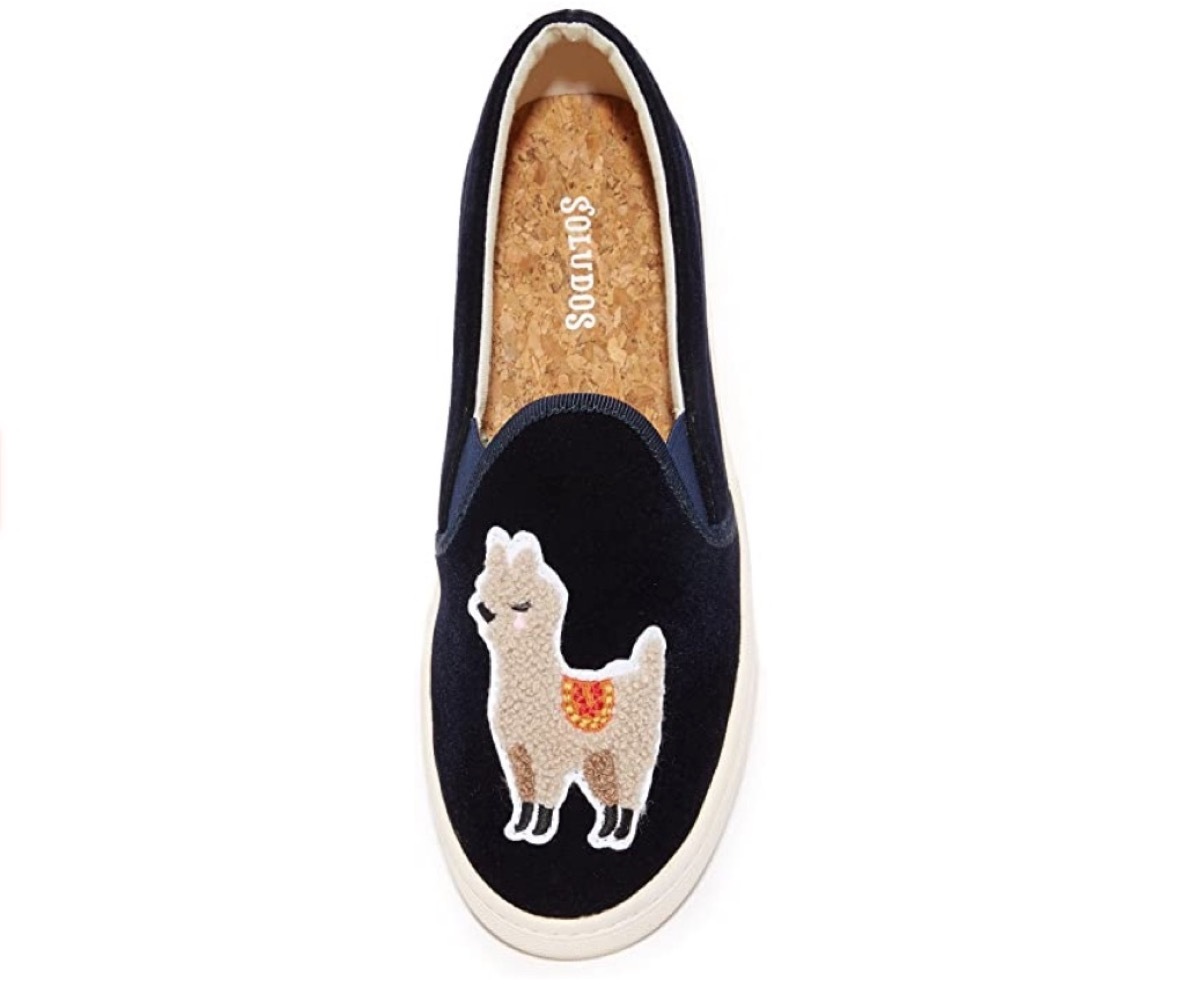 black velvet sneaker with llama on it