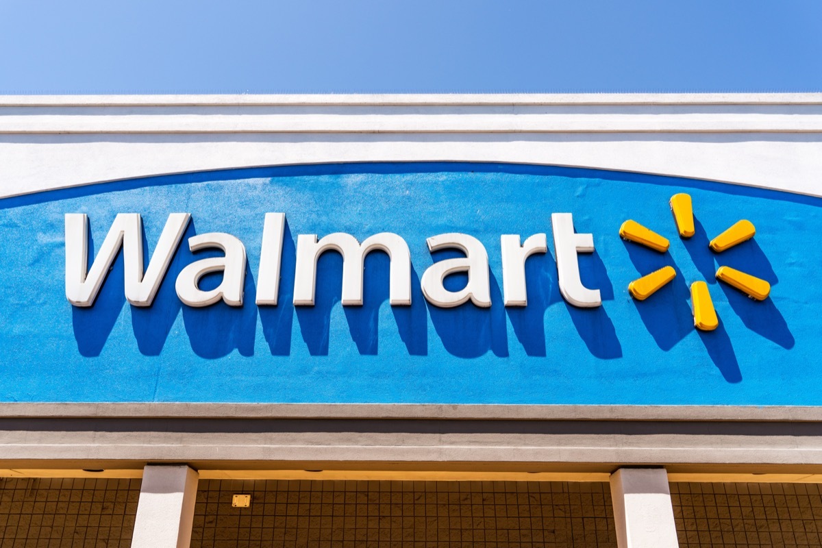 Close up of Walmart logo displayed on the facade of one of their supercenters in South San Francisco bay area