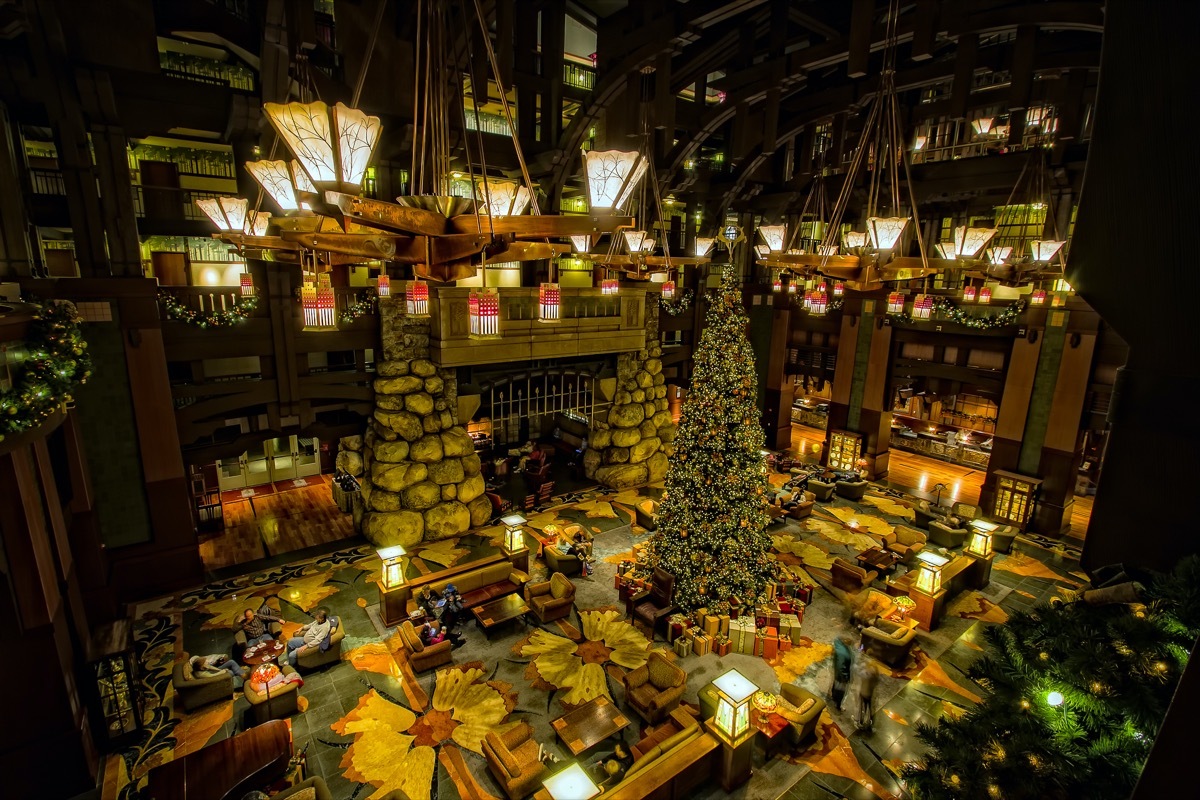 the inside of disney grand californian hotel during christmas