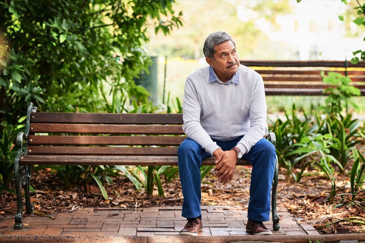 shot of a mature man looking thoughtful outdoors