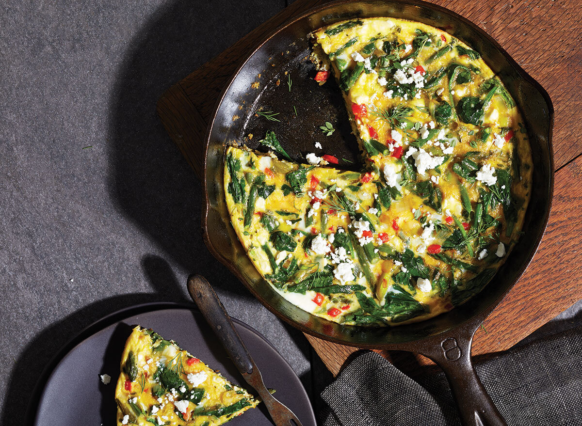 spring vegetable frittata in black cast iron skillet