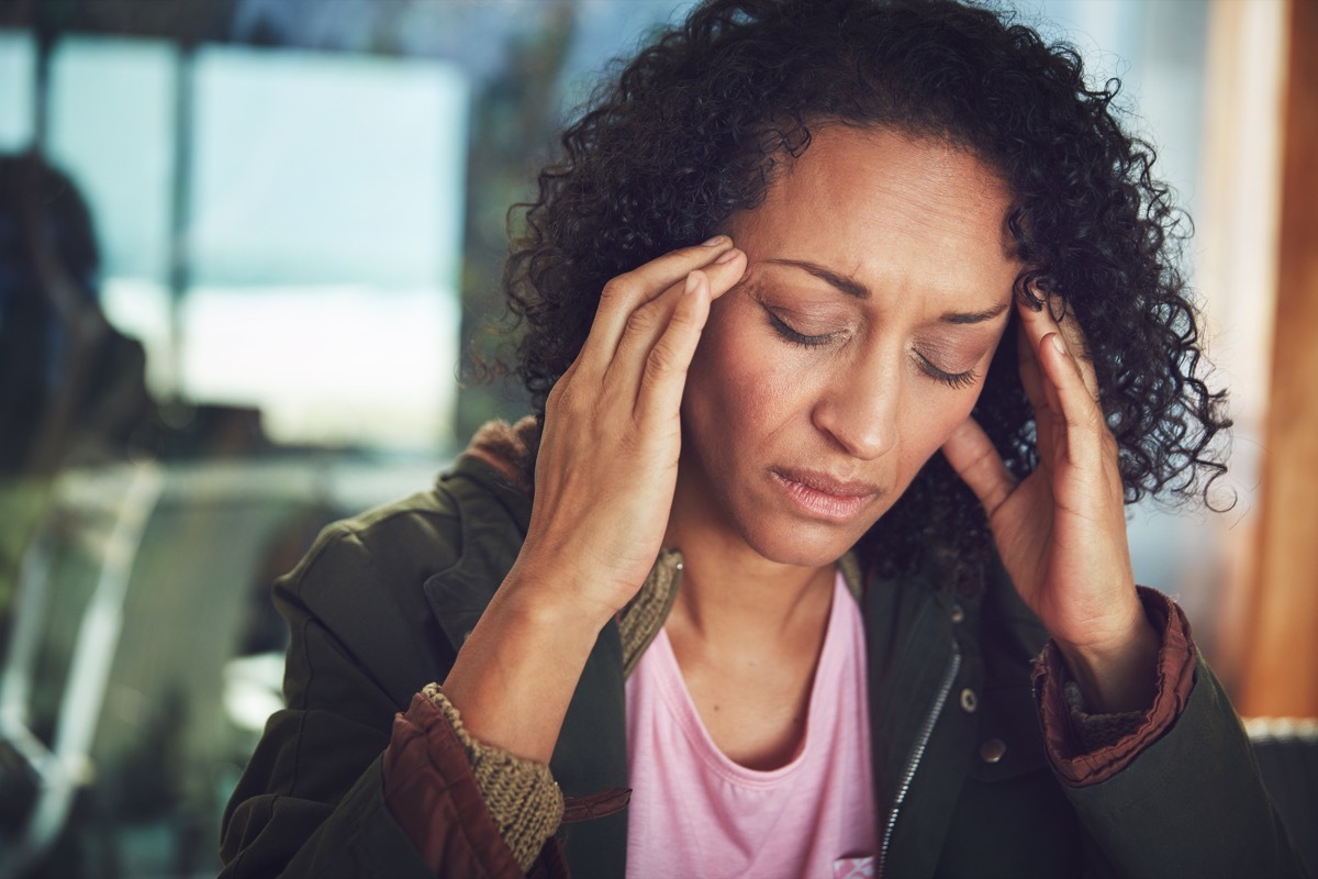 Shot of a mature woman experiencing a headache