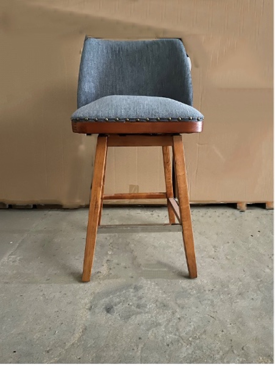 gray stool with wooden legs and metal rivets