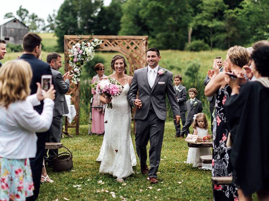 family releases butterflies at wedding