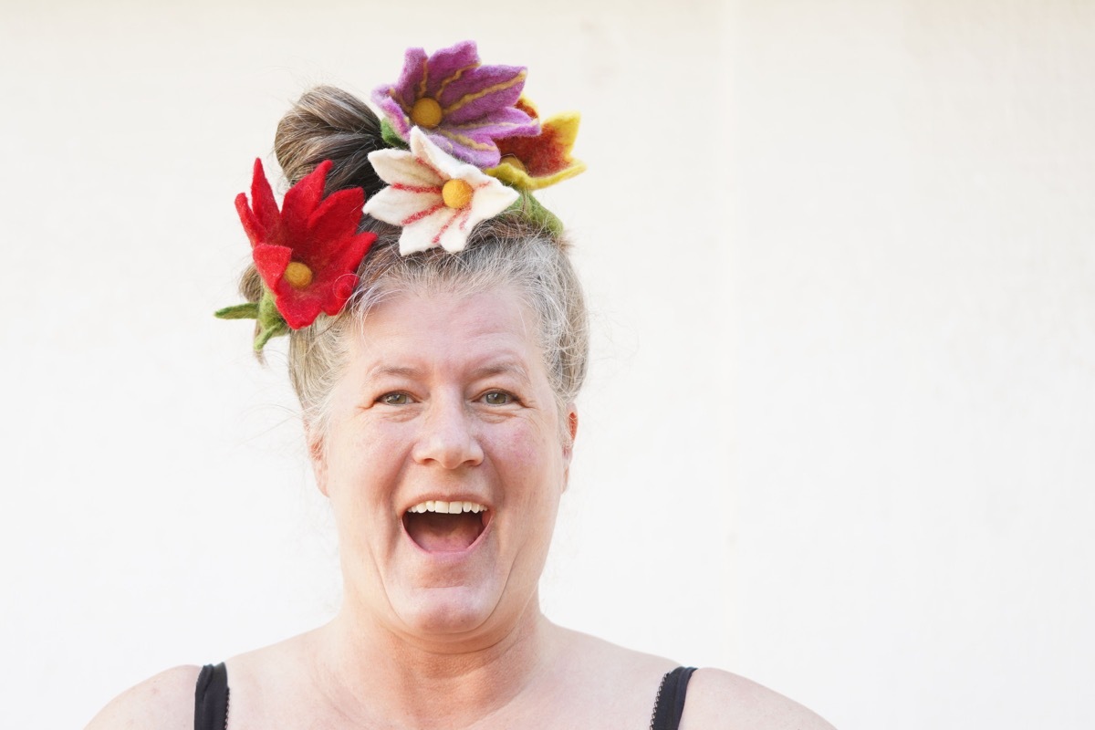 Happy Older Woman with Gray Hair Updo