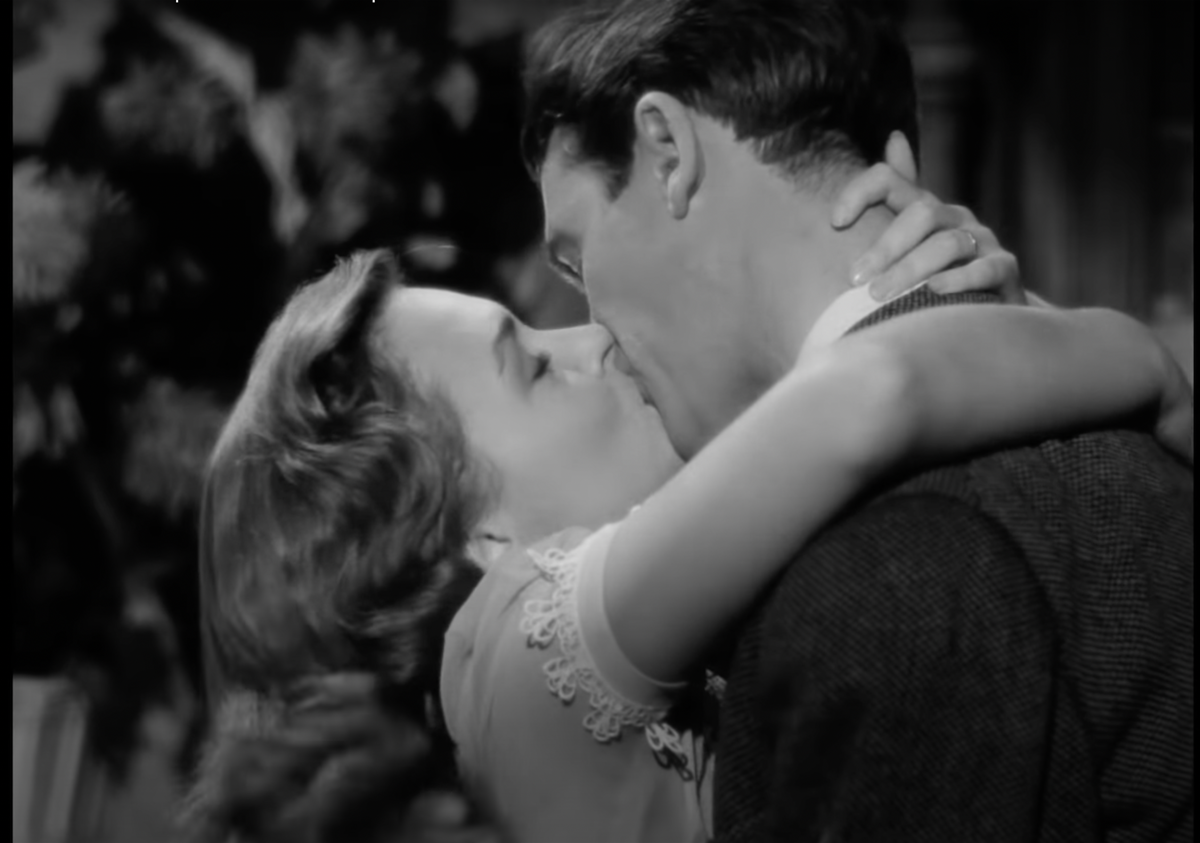 It's a Wonderful Life scene in black and white kissing scene.