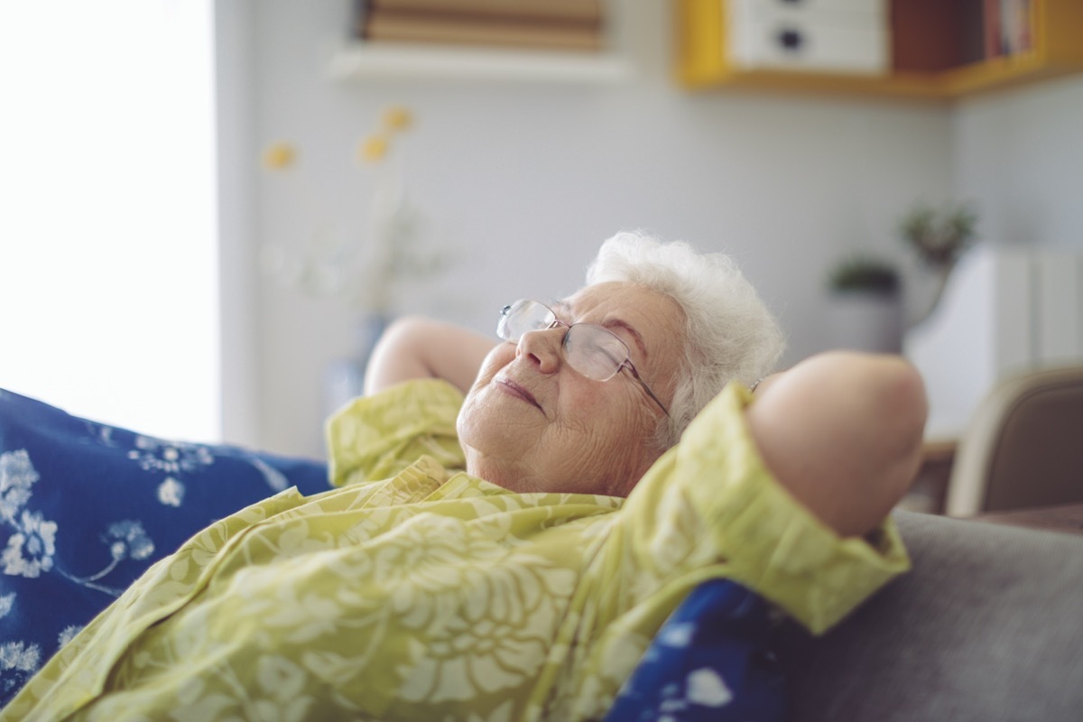 old woman relaxing in home