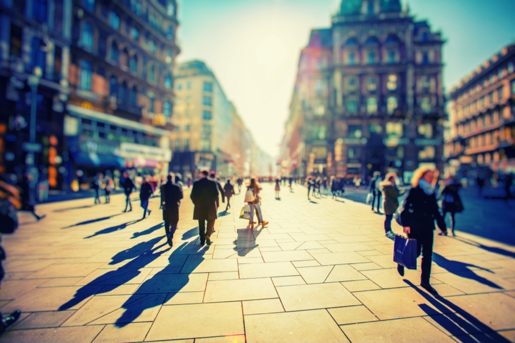 crowd walking in city