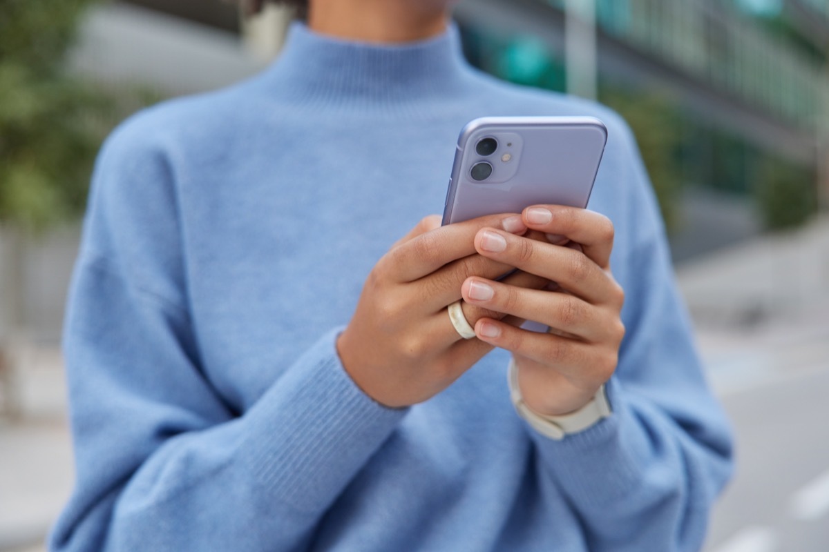 woman using phone outside