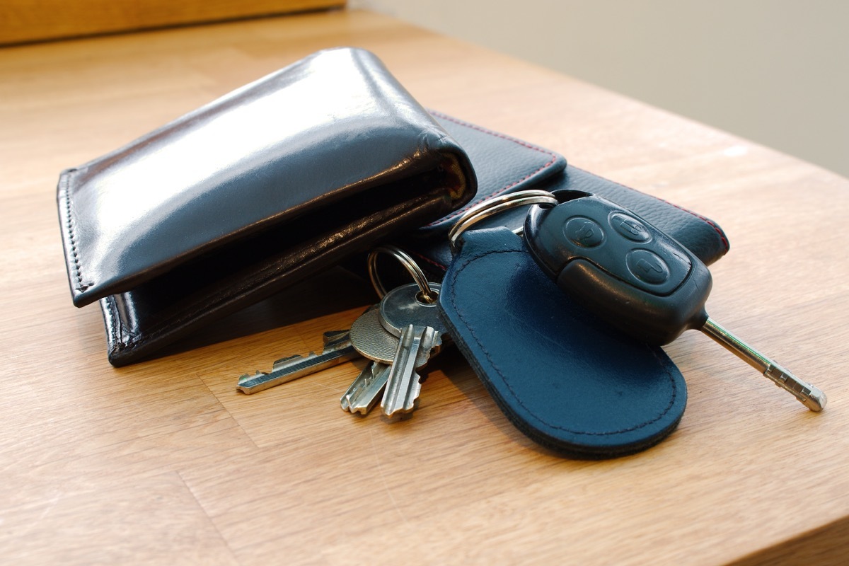 wallet and car keys on table