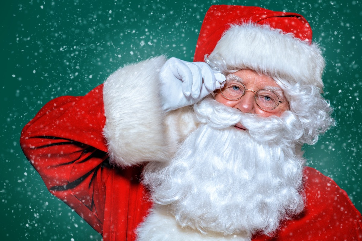 Santa Claus against green background