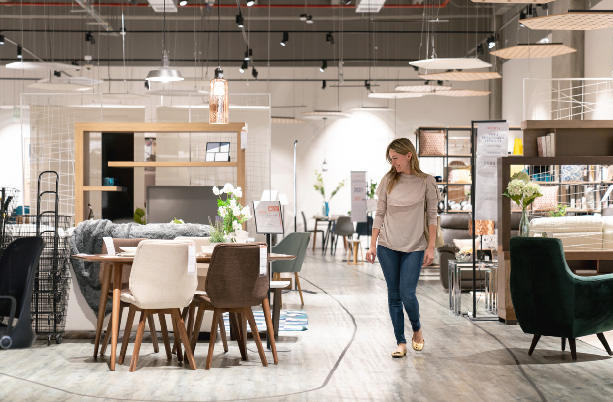 A woman shopping in a furniture store