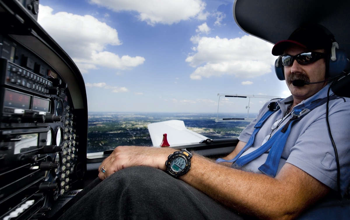 pilot listening through his headphones