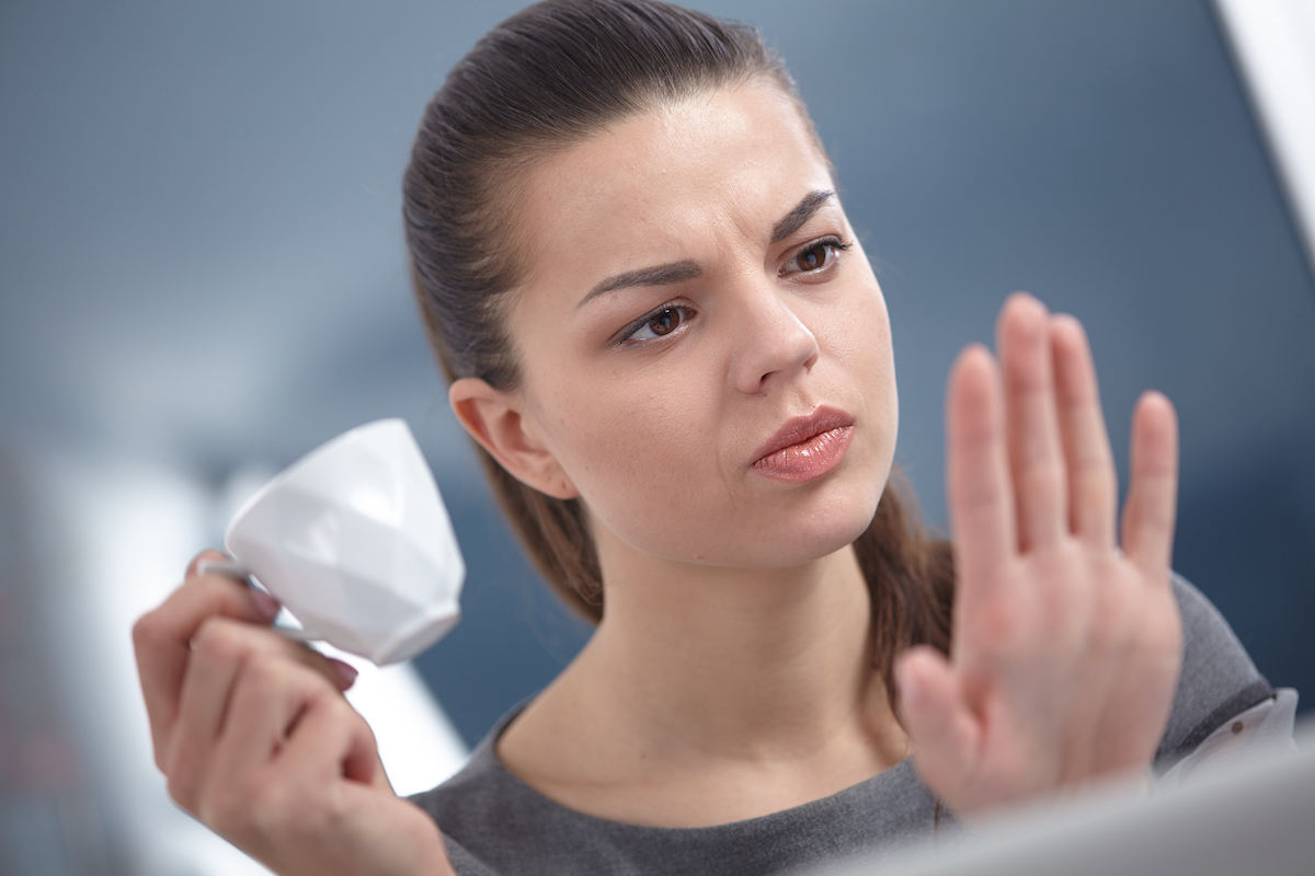 girl looking at her nails