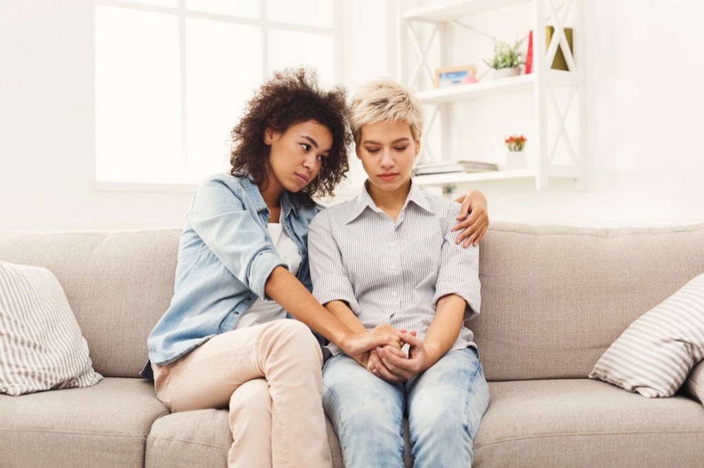 woman comforting friend