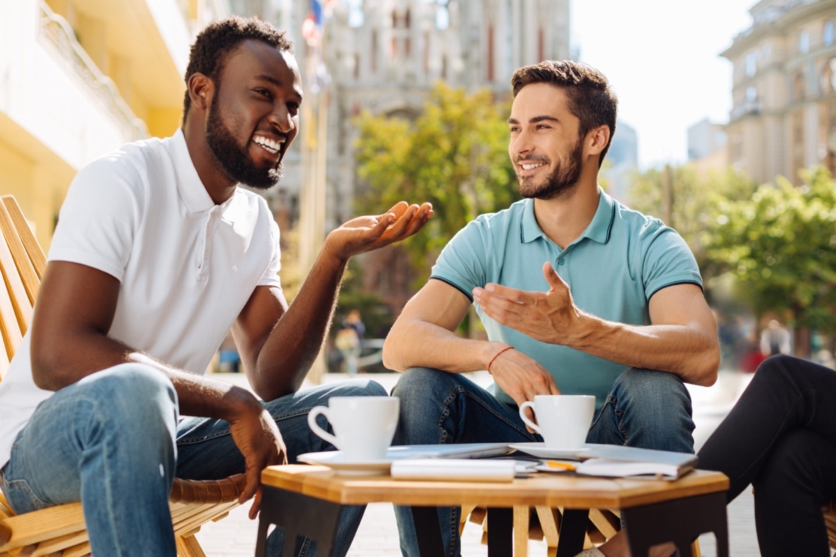 Two Guy Friends Having Coffee