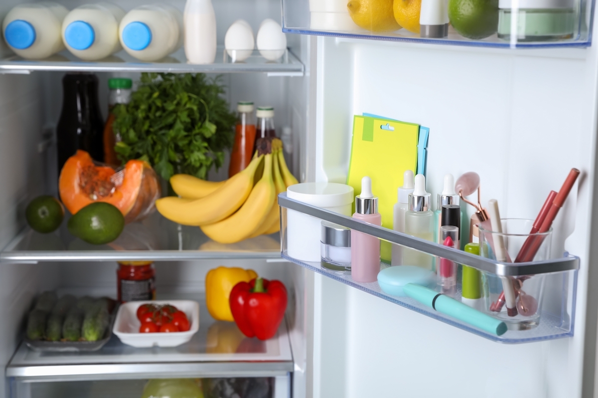 Storage of cosmetics and tools in refrigerator door bin next to groceries