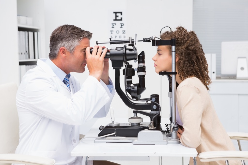 woman getting her eyes checked at the eye doctor