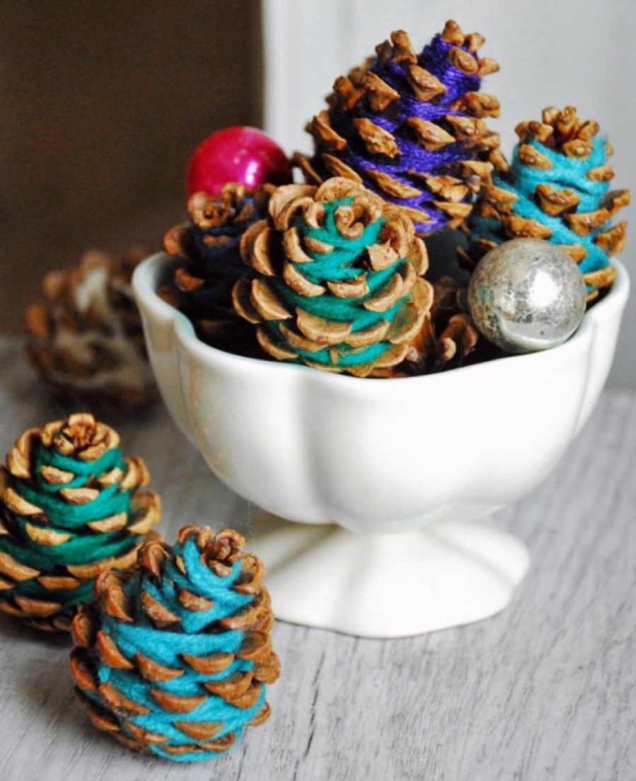 Yarn-wrapped pinecones diy christmas decorations