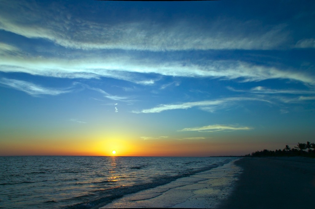 sunset on a beach, date night ideas