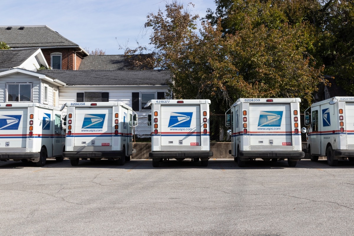 parked usps mail trucks