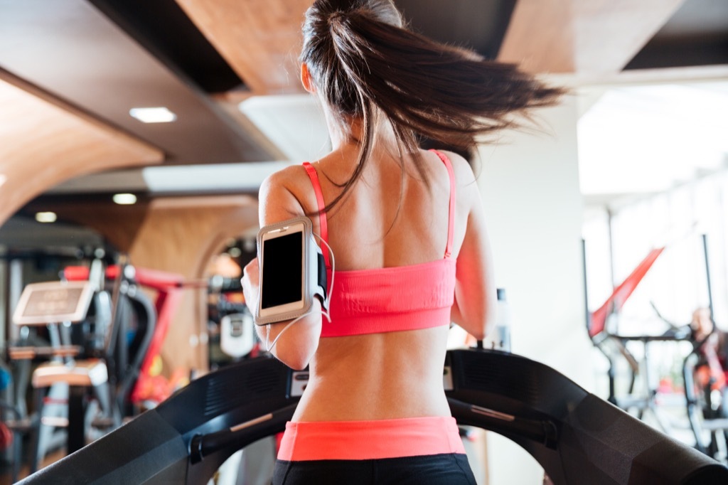 woman running on treadmill