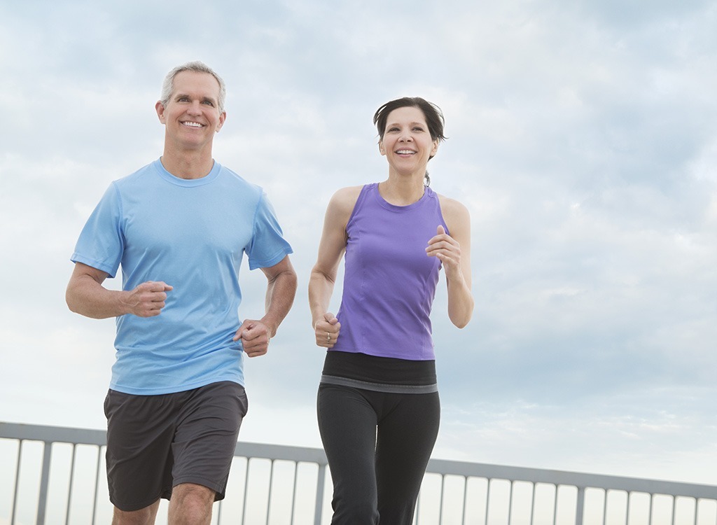 mature couple running