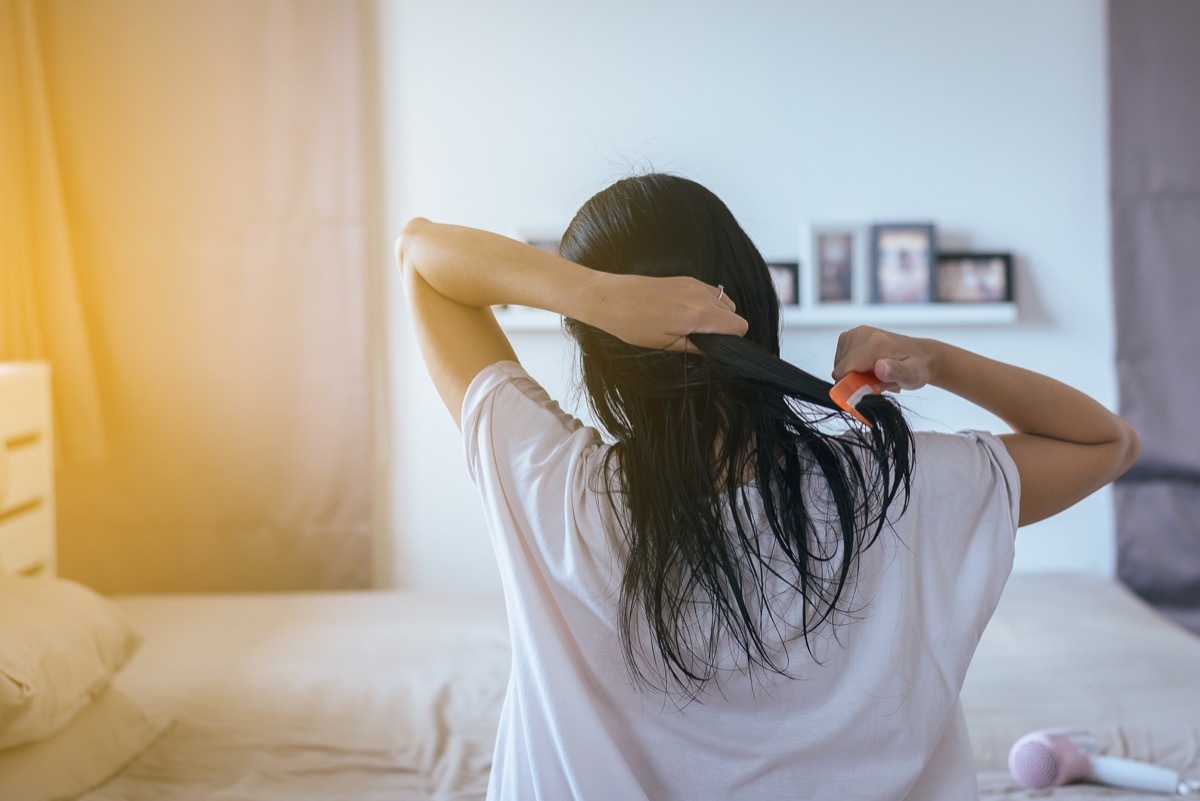 Woman Combing Her Wet Hair Myths