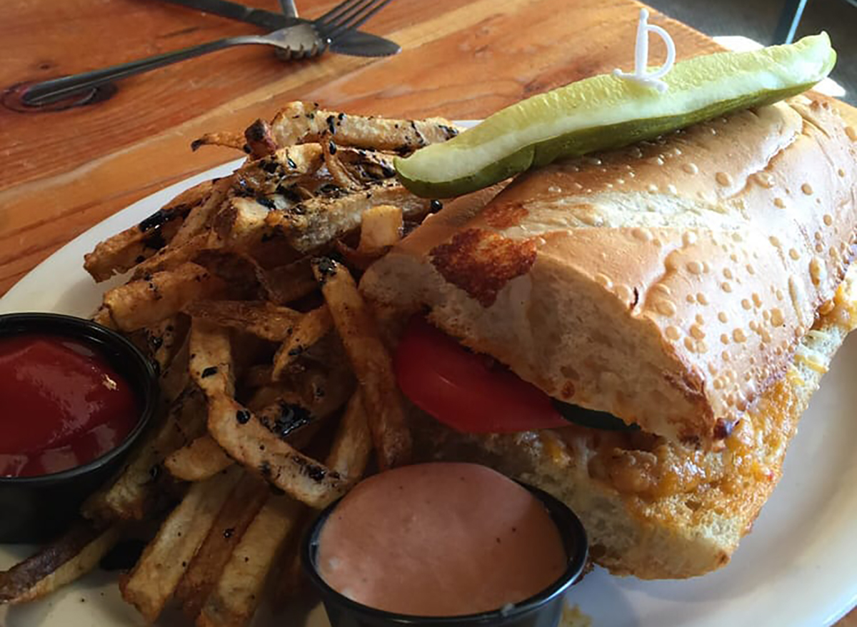 shrimp po boy sandwich with fries