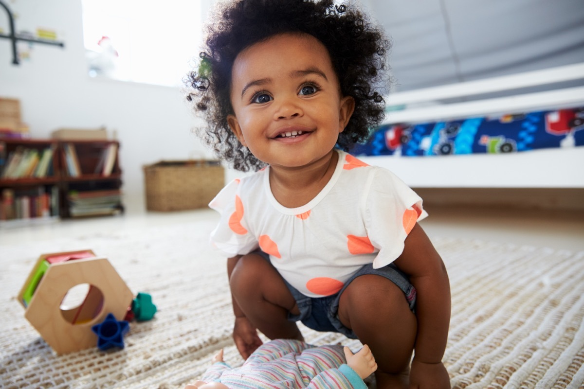 black baby squatting