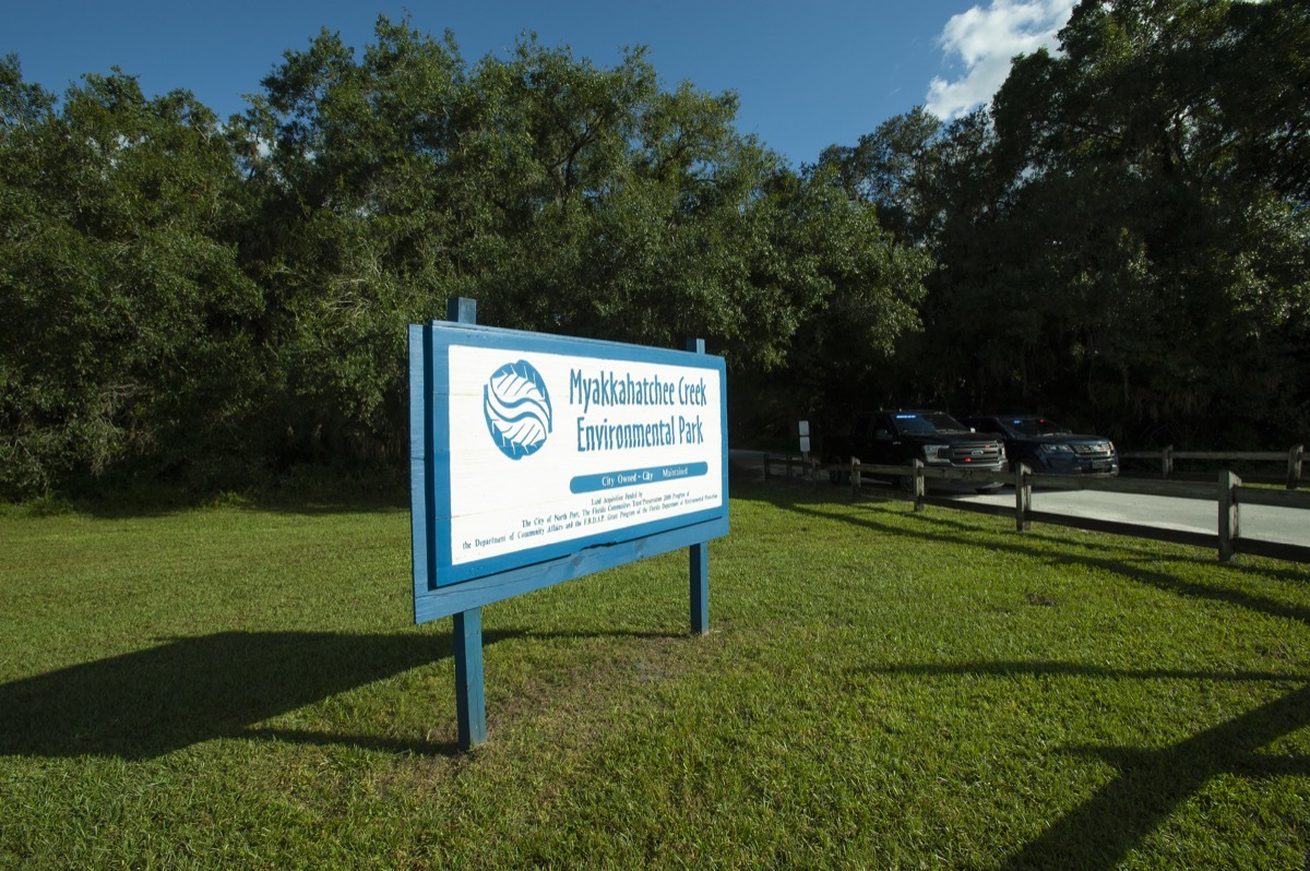 police cars outside of Myakkahatchee Creek Environmental Park