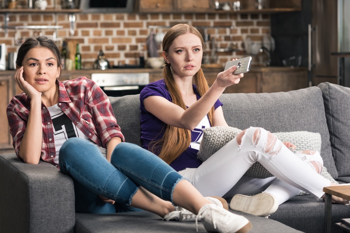 Girls watching tv bored