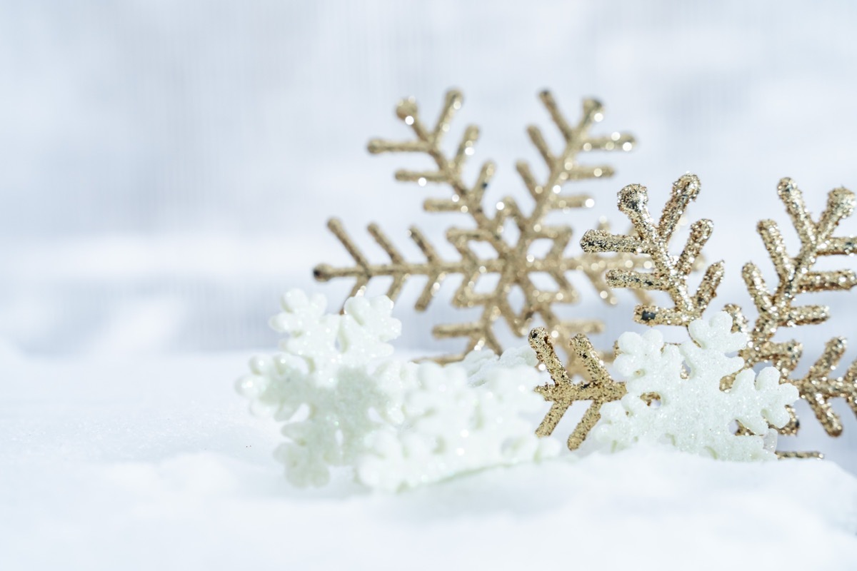 snowflake ornaments on snow