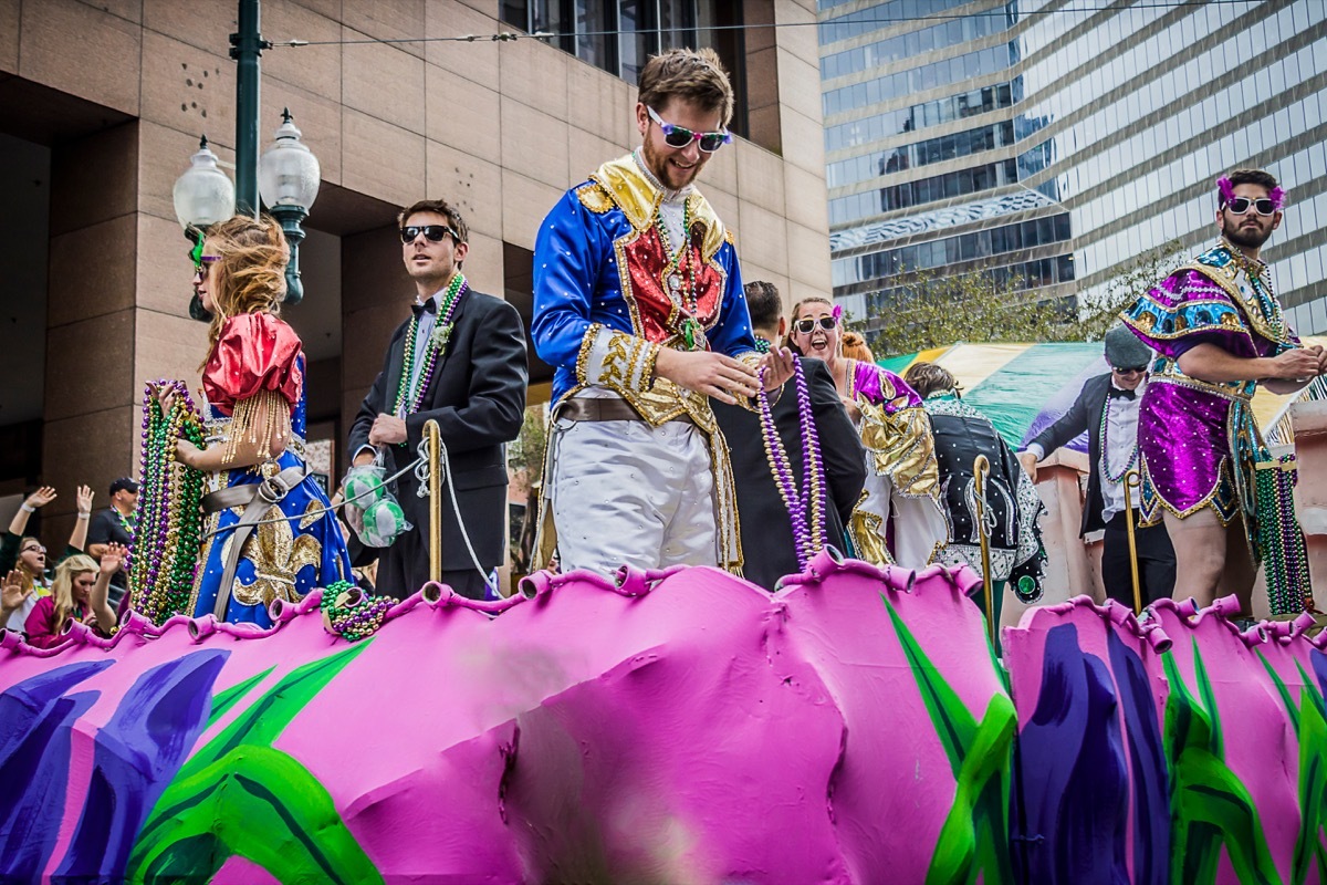 people on a mardi gras float